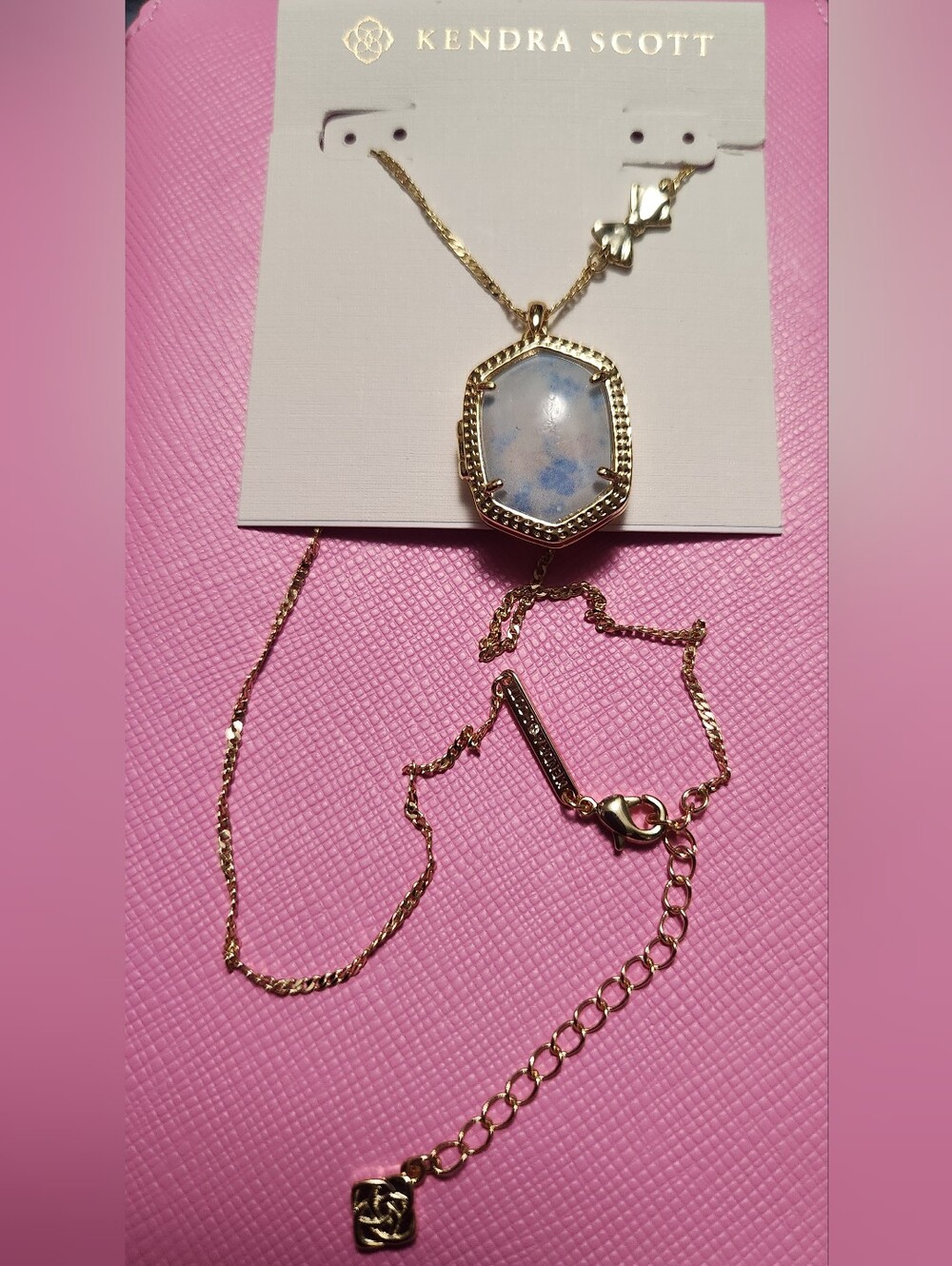 KENDRA SCOTT, LOCKET NECKLACE, NEW, BLUE FLORAL, BOW DESIGN ON BACK, NEW